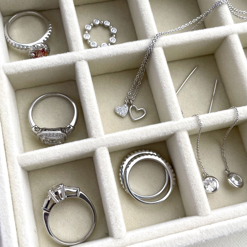 Image Contain: Halo Ring, Heart Pendant Necklace, Threader Earrings