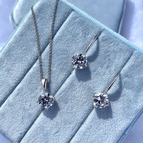 Image Contain: Solitaire Dangle Earrings, Solitaire Pendant Necklace