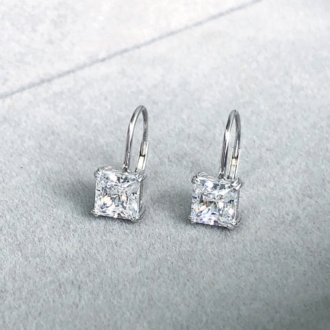 Image Contain: Solitaire Dangle Earrings