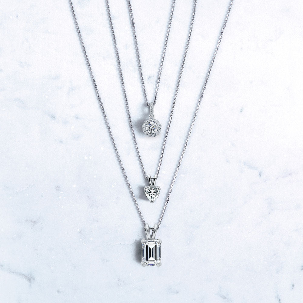 Flatlay view of Solitaire 1ct Emerald Cut CZ Necklace in Sterling Silver, 5 of 6