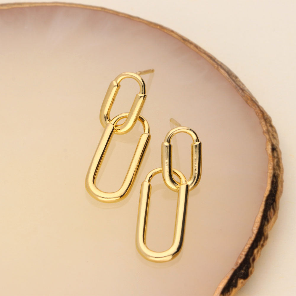 Flatlay view of Paperclip Interlocking Earrings in Sterling Silver, Yellow Gold Flashed