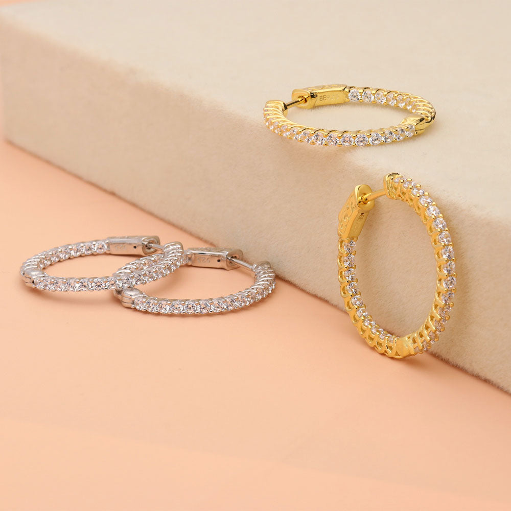 Flatlay view of CZ Small Inside-Out Hoop Earrings in Sterling Silver 1 inch