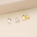 Flatlay view of Cross Stud Earrings in Sterling Silver