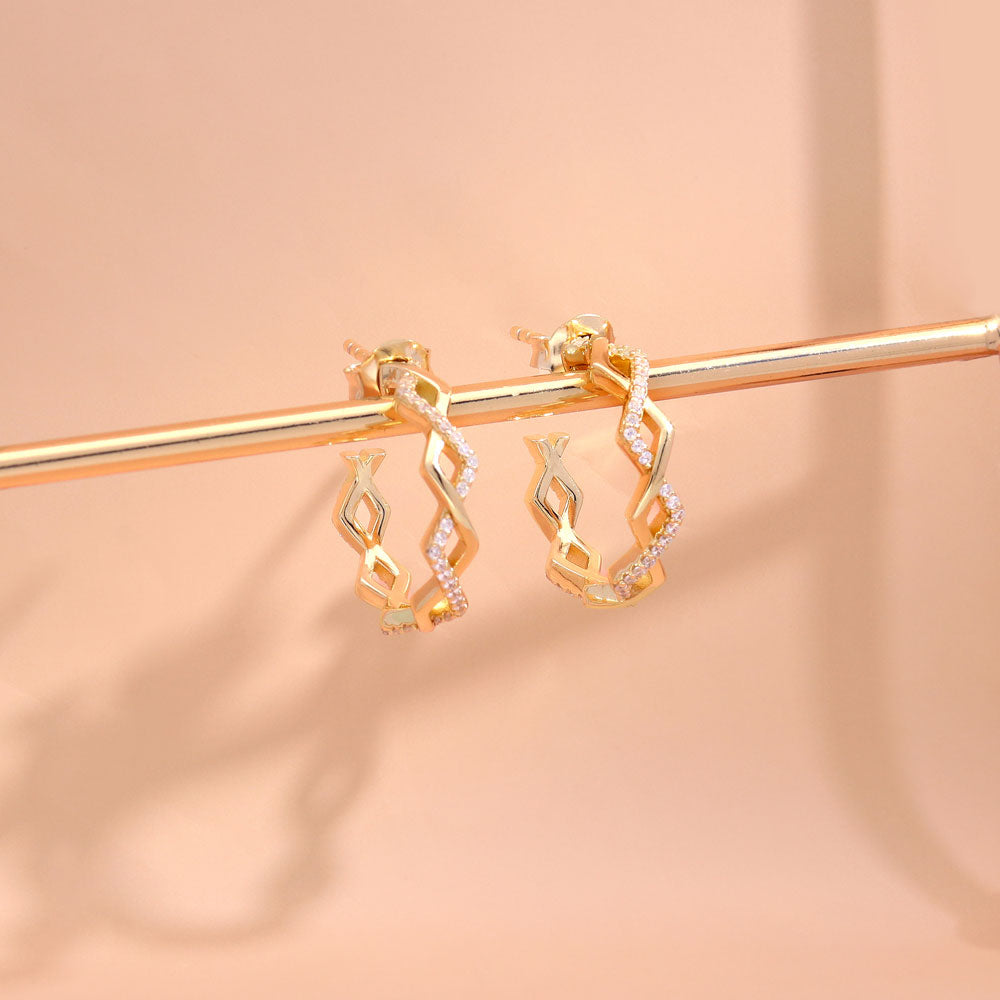 Flatlay view of Woven CZ Small Hoop Earrings in Sterling Silver 0.8 inch, Yellow Gold Flashed