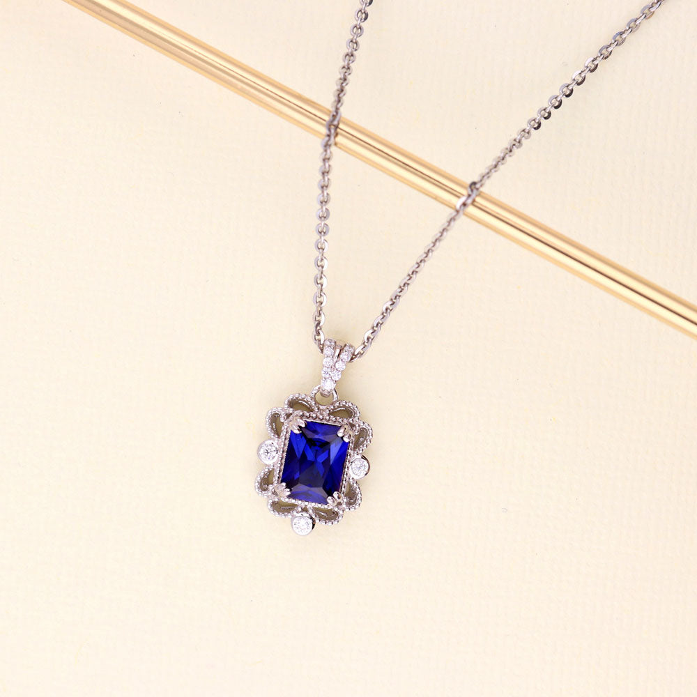 Milgrain Simulated Blue Sapphire CZ Pendant Necklace in Sterling Silver
