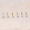 Flatlay view of Solitaire CZ Leverback Earrings in Gold Flashed Sterling Silver