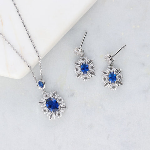 Image Contain: Flower Dangle Earrings, Flower Pendant Necklace