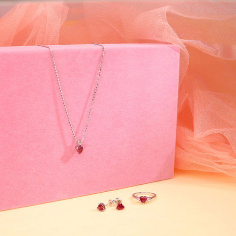 Image Contain: 3-Stone Ring, Solitaire Pendant Necklace, Solitaire Stud Earrings
