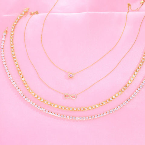 Image Contain: Cable Tennis Necklace, Halo Pendant Necklace, Infinity Pendant Necklace, Tennis Necklace