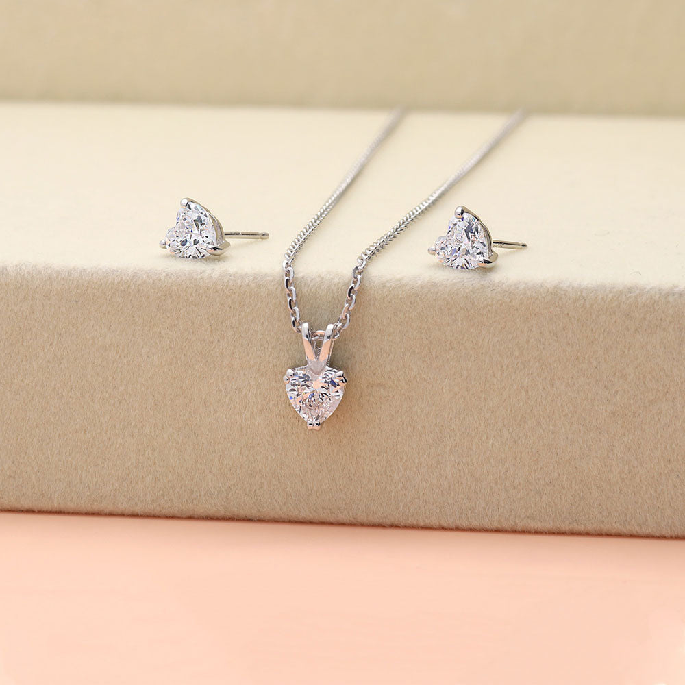 Image Contain: Solitaire Pendant Necklace, Solitaire Stud Earrings