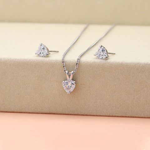 Image Contain: Solitaire Pendant Necklace, Solitaire Stud Earrings
