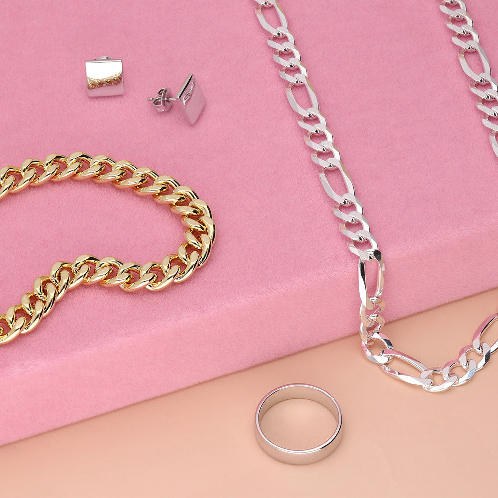 Image Contain: Band, Chain Bracelet, Chain Necklace, Square Stud Earrings