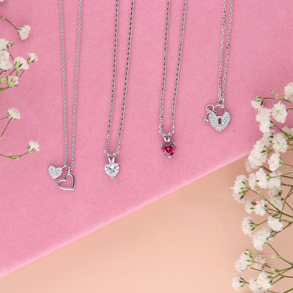 Image Contain: Heart Pendant Necklace, Key and Lock Pendant Necklace, Solitaire Pendant Necklace