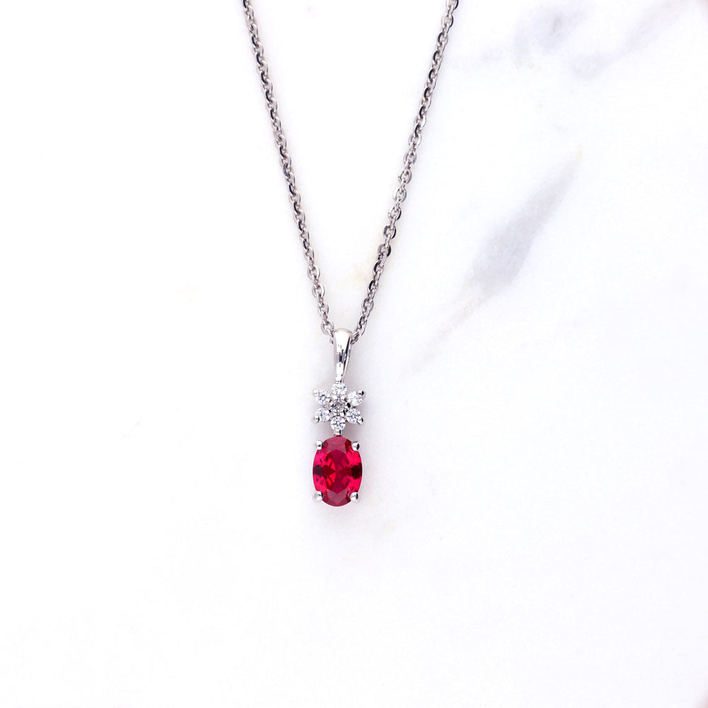 Flatlay view of Flower Ruby-Red CZ Set in Sterling Silver, 6 of 10
