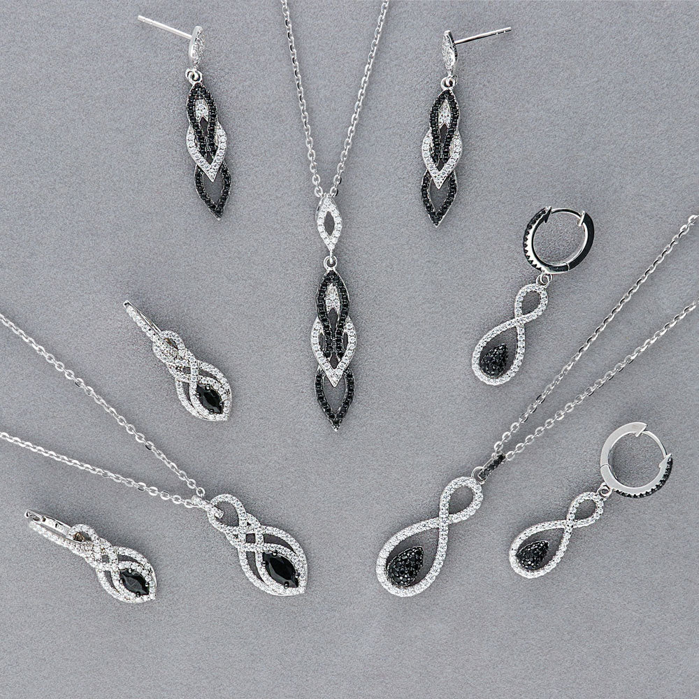 Image Contain: Black and White Dangle Earrings, Black and White Pendant Necklace