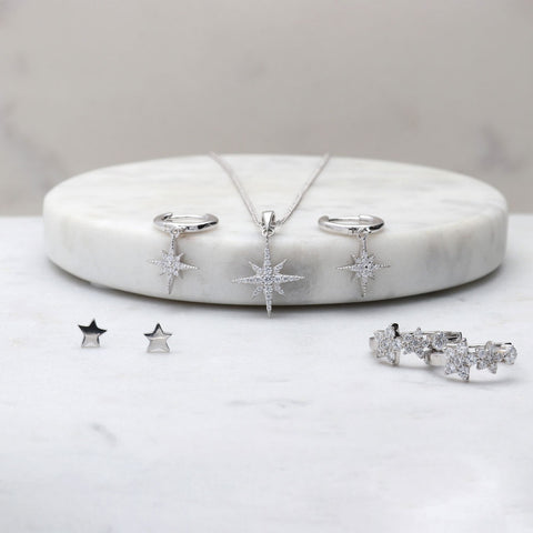 Image Contain: North Star Pendant Necklace, Star Hoop Earrings, Star Stud Earrings, Starburst Dangle Earrings