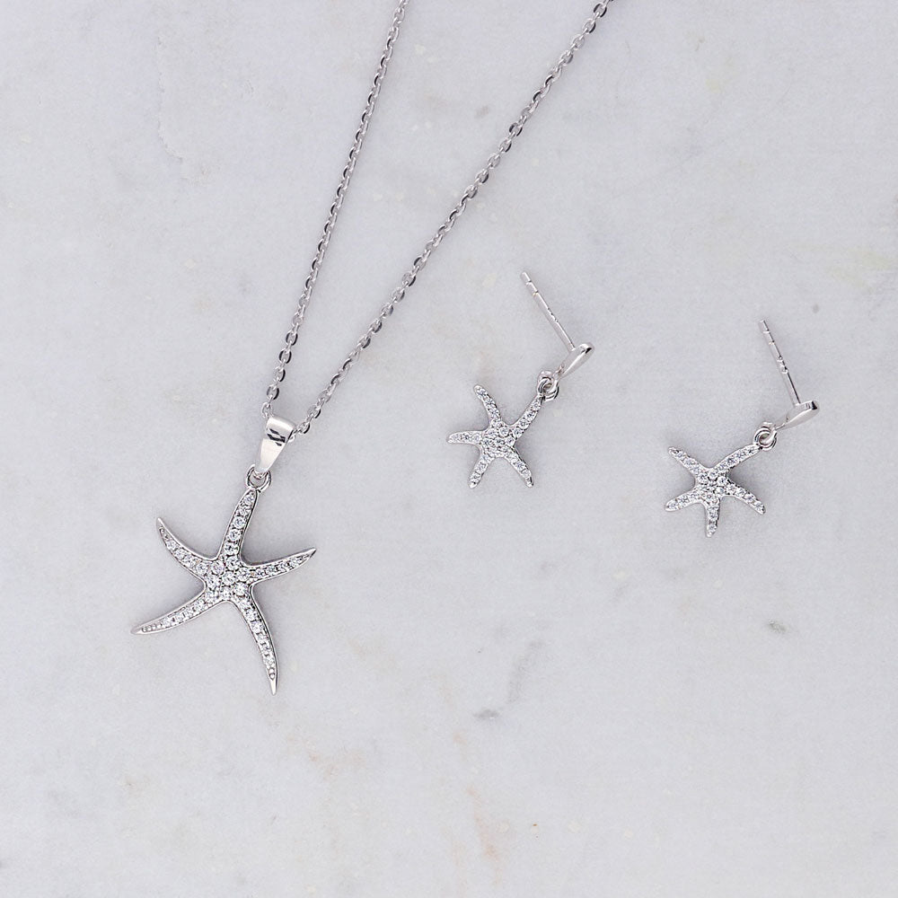 Flatlay view of Starfish CZ Dangle Earrings in Sterling Silver, 2 of 3