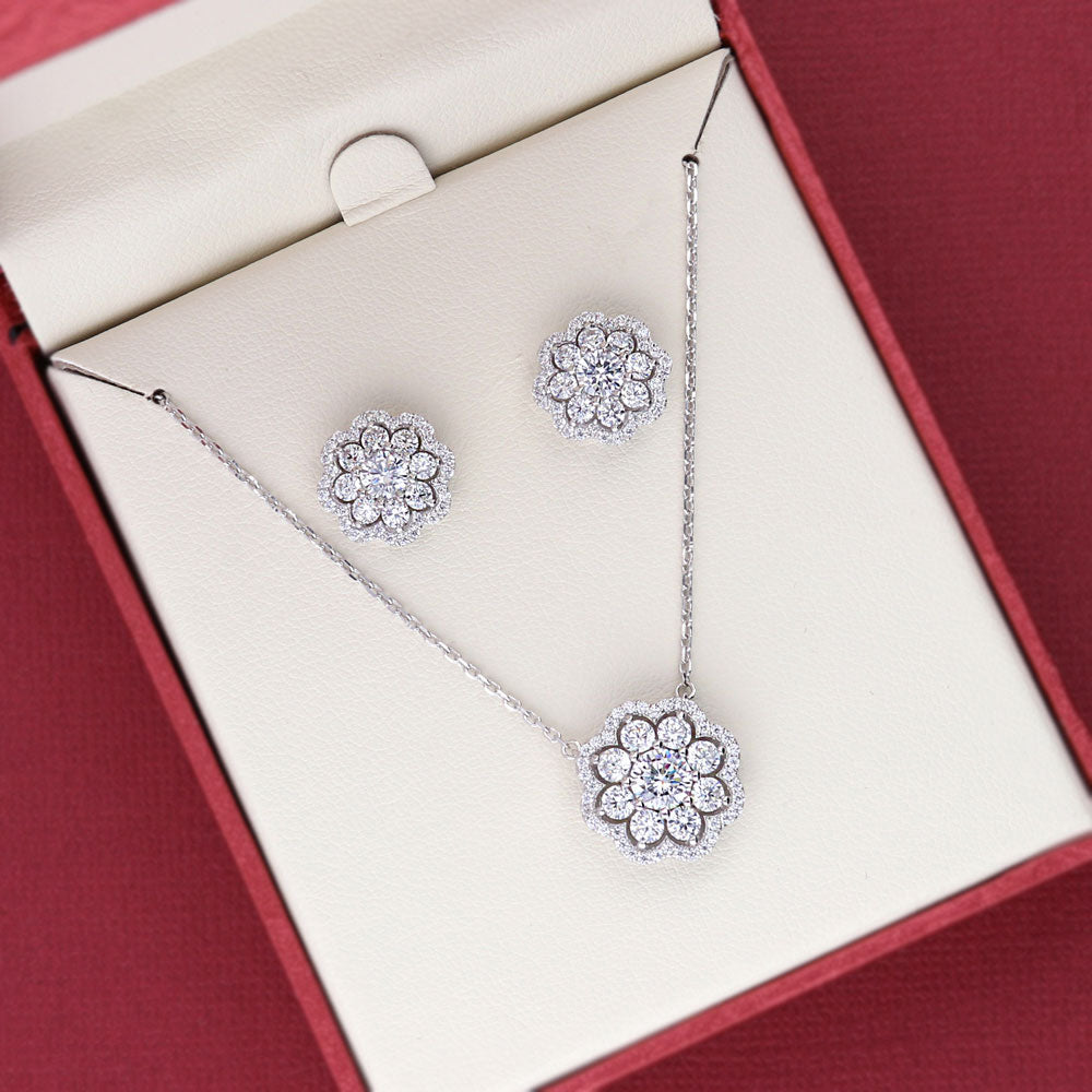 Flatlay view of Flower Halo CZ Stud Earrings in Sterling Silver, 5 of 7
