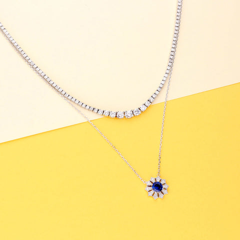 Image Contain: Graduated Tennis Necklace, Halo Pendant Necklace