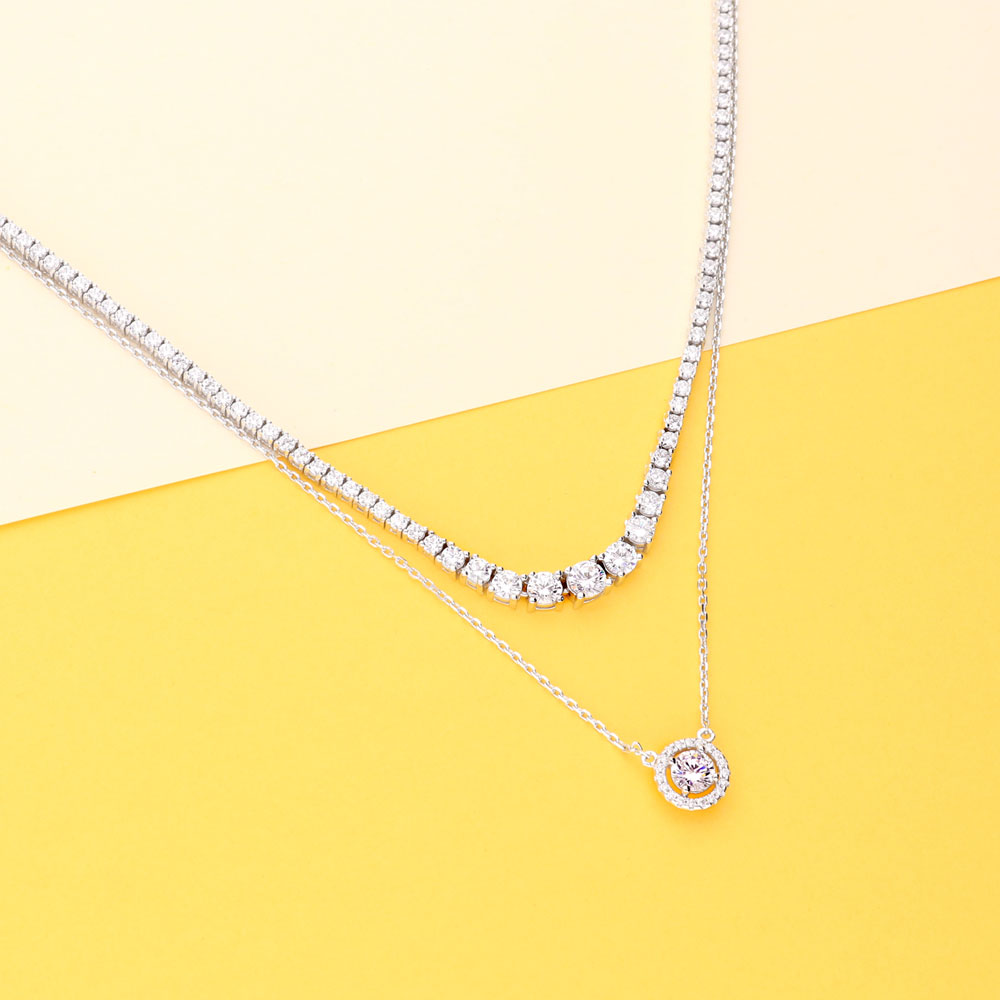 Image Contain: Graduated Tennis Necklace, Halo Pendant Necklace