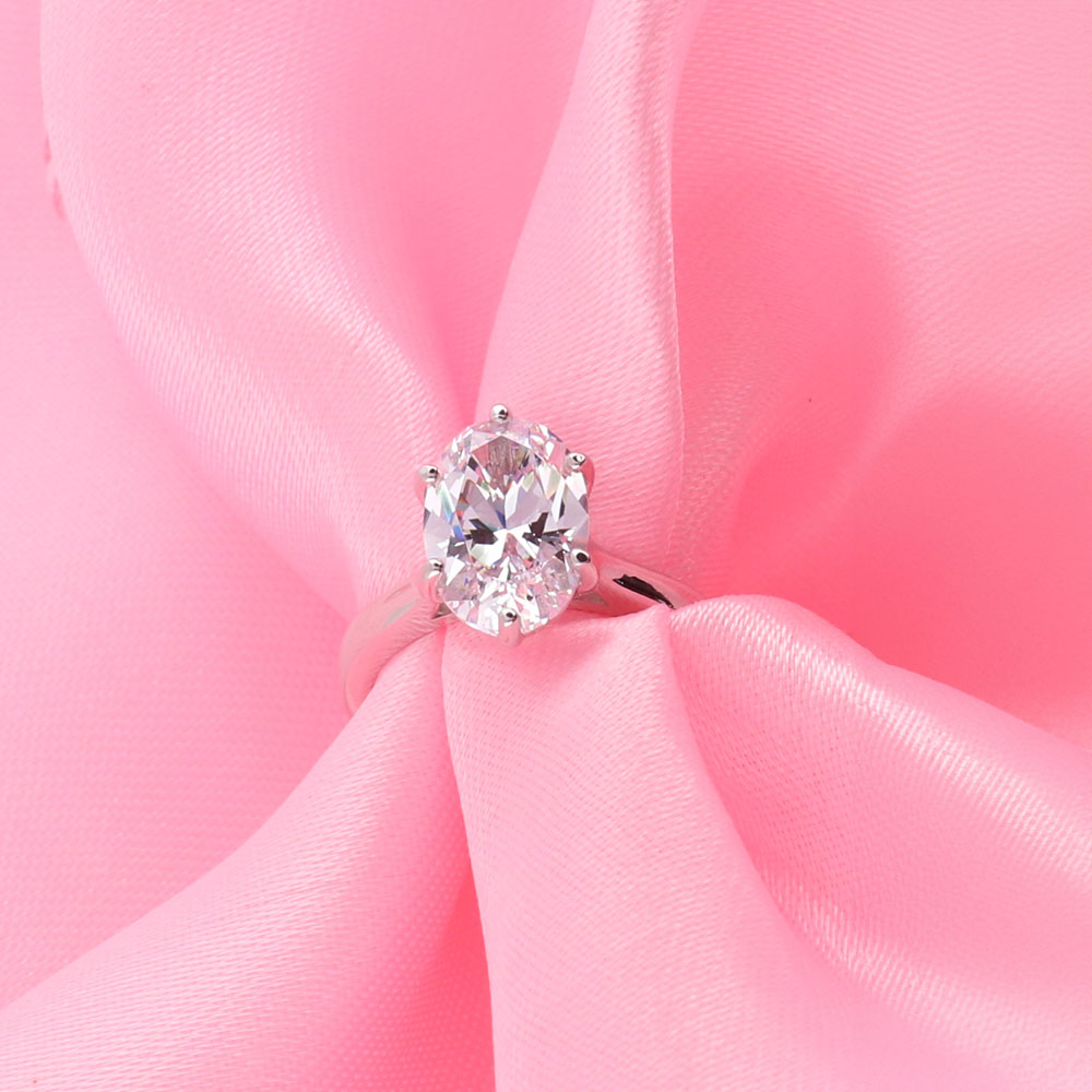 Flatlay view of Solitaire 3ct Oval CZ Ring in Sterling Silver, 11 of 16