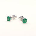 Flatlay view of Solitaire CZ Stud Earrings in Sterling Silver 1.6ct, Emerald Color