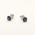 Flatlay view of Solitaire CZ Stud Earrings in Sterling Silver 1.6ct, Sapphire Color