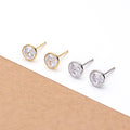 Flatlay view of Solitaire Bezel CZ Stud Earrings in Gold Flashed Sterling Silver, 4mm