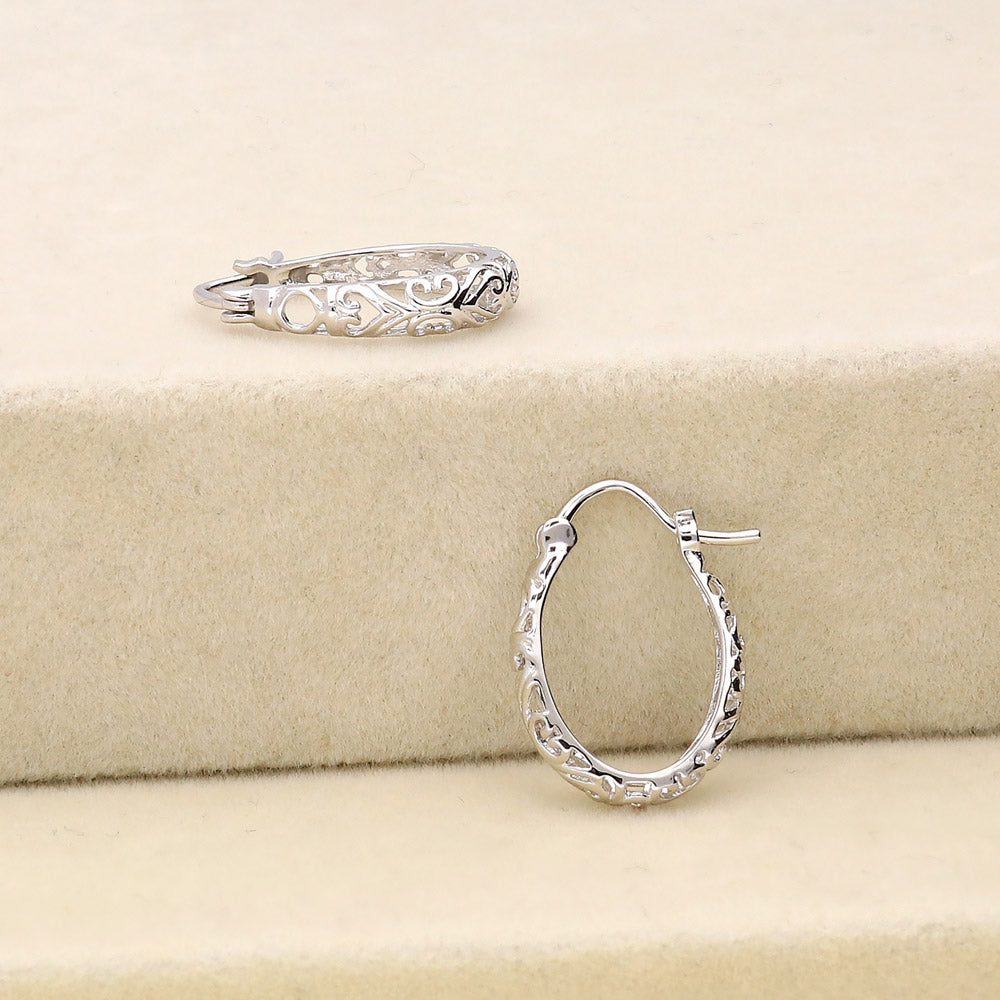 Flatlay view of Oval Filigree Small Hoop Earrings in Sterling Silver 0.8 inch, 4 of 5