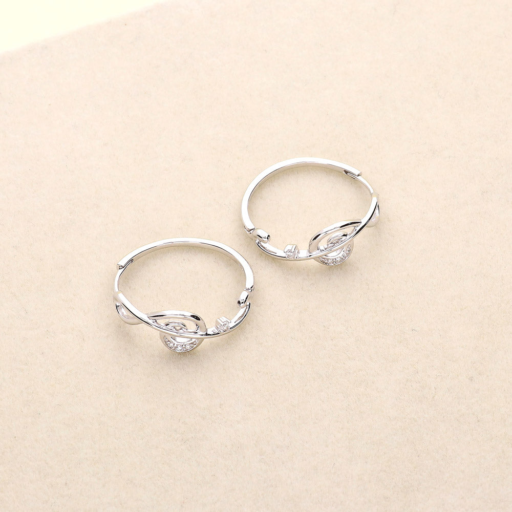 Flatlay view of Treble Clef Music Note CZ Hoop Earrings in Sterling Silver 0.9 inch, 5 of 5