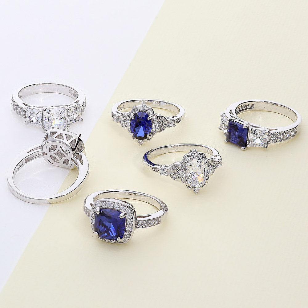 Flatlay view of 3-Stone 2.1ct Emerald Cut CZ Ring in Sterling Silver, 16 of 17