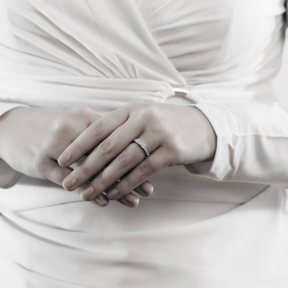 Model wearing Pave CZ Eternity Ring in Sterling Silver, 2 of 5