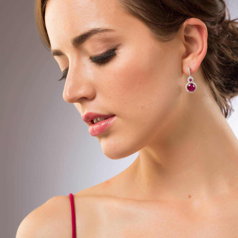 Halo Simulated Ruby Round CZ Dangle Earrings in Sterling Silver