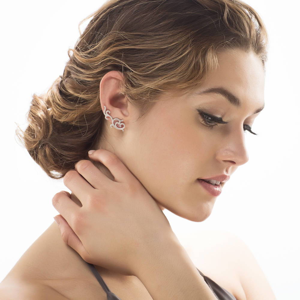 Model wearing Filigree CZ Ear Crawler Cartilage Earrings in Sterling Silver, 2 of 3