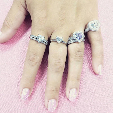 Image Contain: Model Wearing Half Eternity Ring, Halo Ring, Solitaire Ring, Solitaire with Side Stones Ring