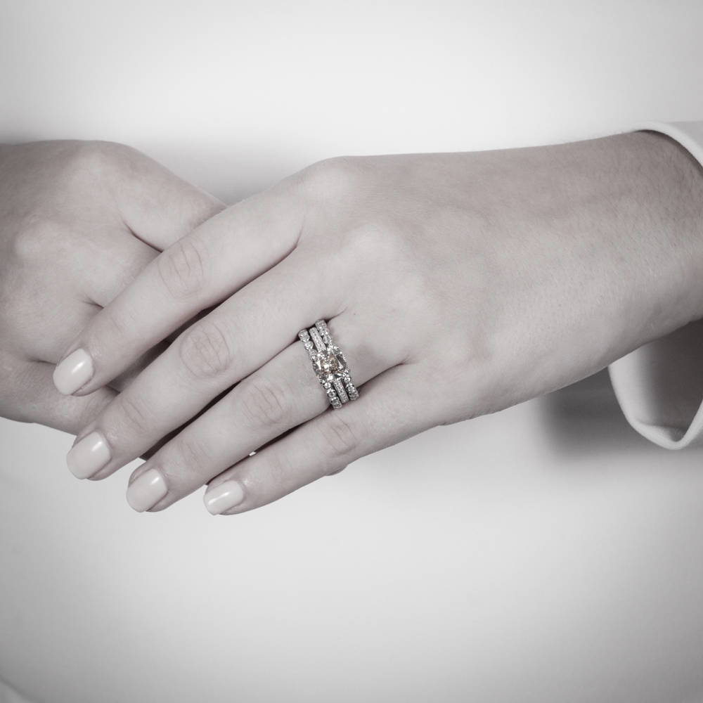 Model wearing Solitaire 3ct Canary Yellow Cushion CZ Ring in Sterling Silver, 14 of 18