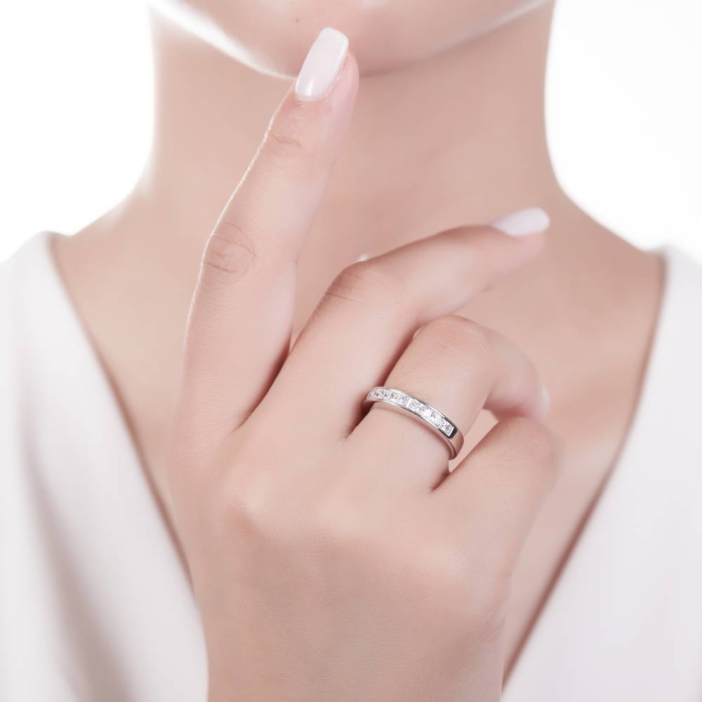 Model wearing Channel Set Princess CZ Half Eternity Ring in Sterling Silver, 5 of 6
