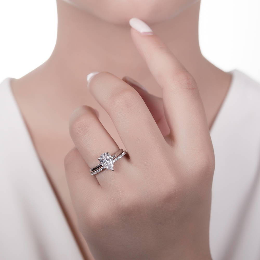 Model wearing Solitaire 1.8ct Pear CZ Ring Set in Sterling Silver, 2 of 16
