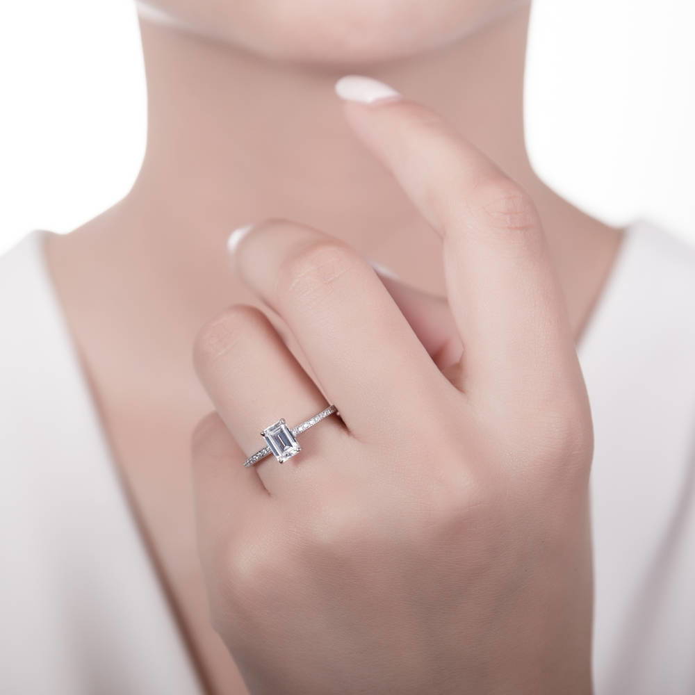 Model wearing Solitaire 1ct Emerald Cut CZ Ring in Sterling Silver, 2 of 7