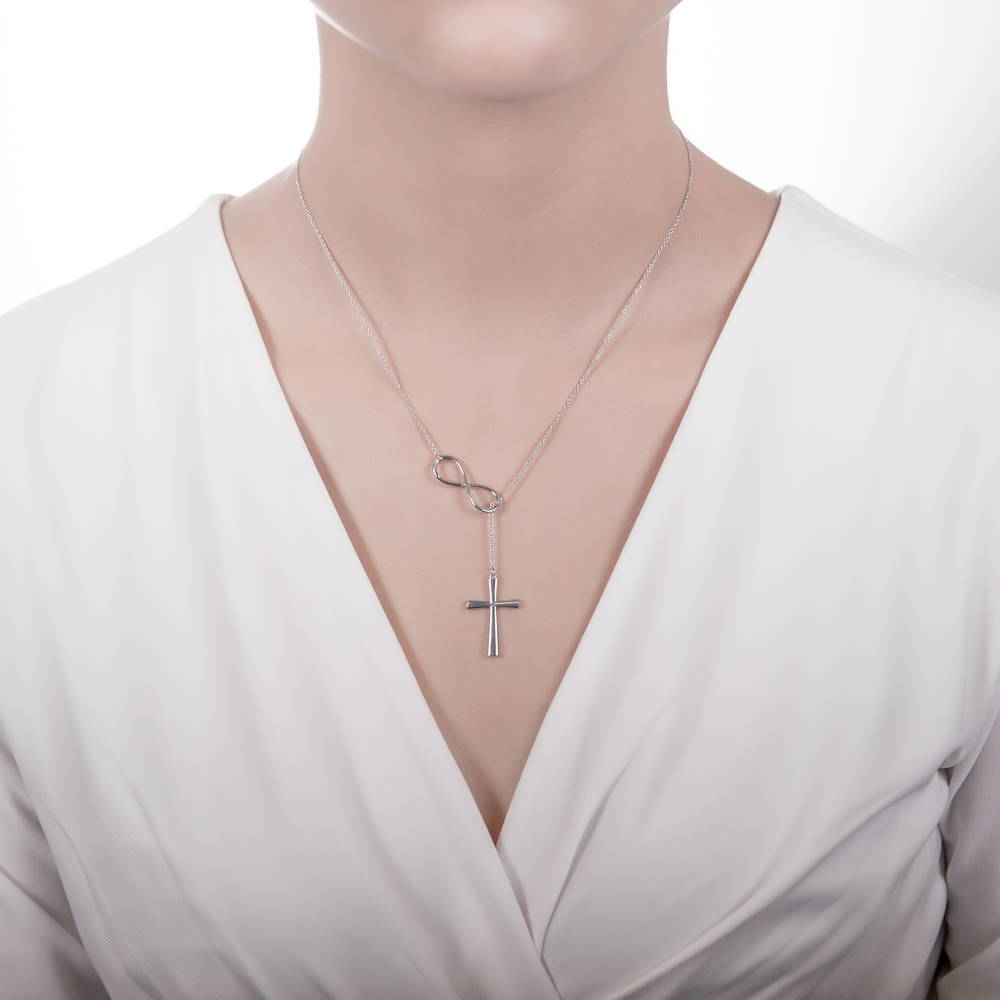 Model wearing Infinity Cross Lariat Necklace in Sterling Silver, 6 of 7