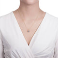 Model wearing Solitaire Asscher CZ Necklace in Sterling Silver 3ct, Yellow Gold Flashed