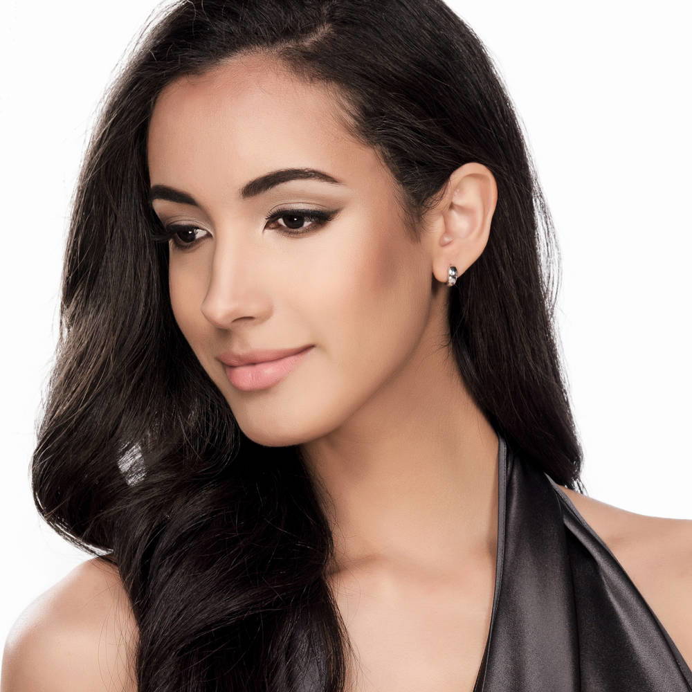 Model wearing Dome Huggie Earrings in Gold Flashed Sterling Silver, 2 Pairs, 10 of 12