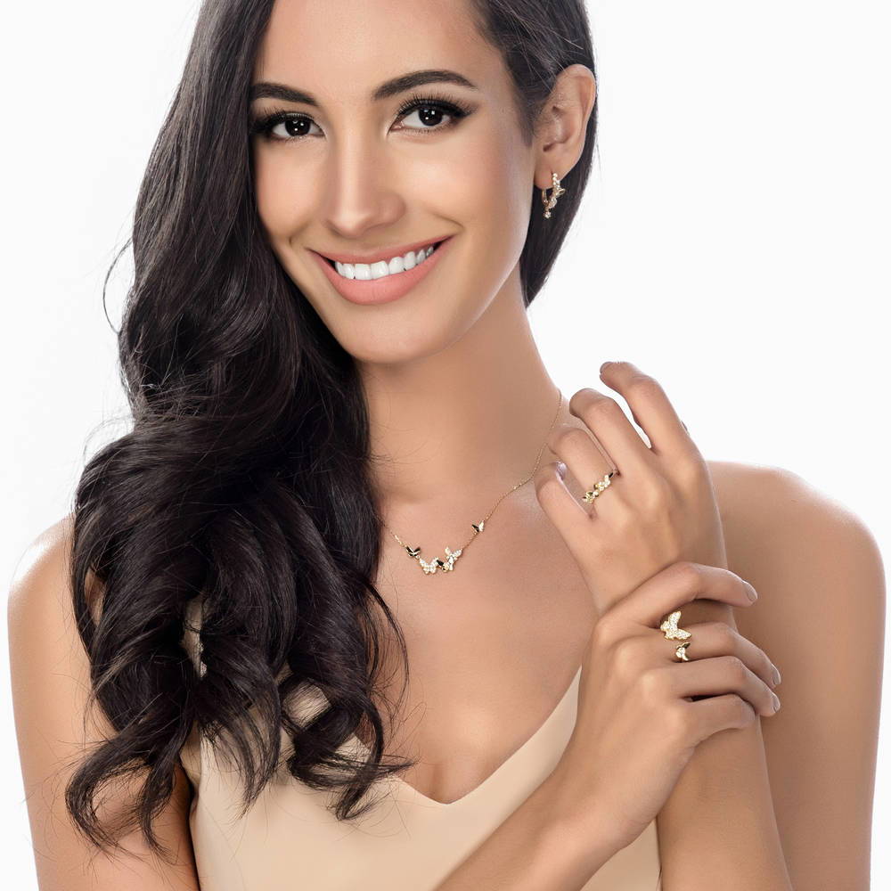 Model wearing Butterfly CZ Hoop Earrings in Gold Flashed Sterling Silver 0.8 inch, 3 of 3