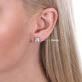 Model wearing Solitaire Princess CZ Stud Earrings in Sterling Silver, 4mm