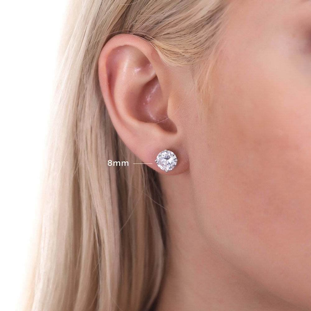 Model wearing Solitaire CZ Stud Earrings in Sterling Silver, 8mm
