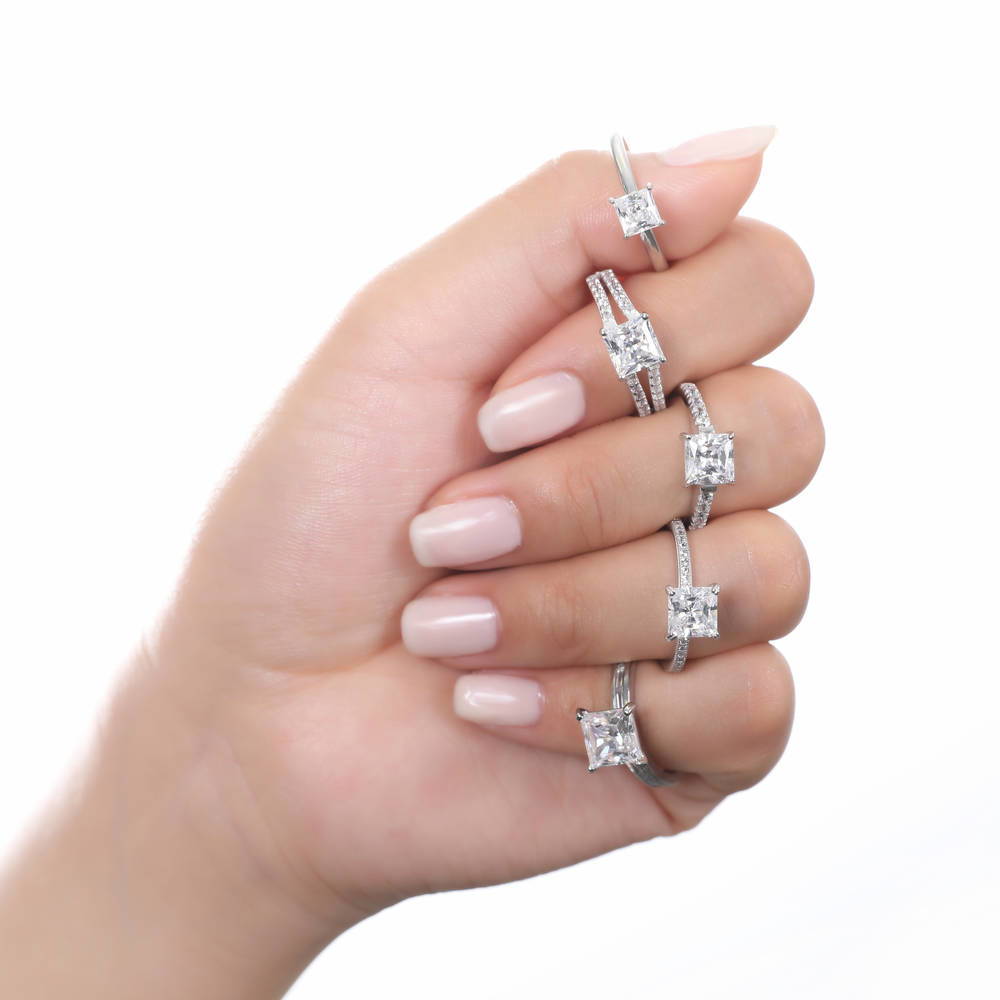 Model wearing Solitaire 2ct Princess CZ Split Shank Ring in Sterling Silver, 9 of 9