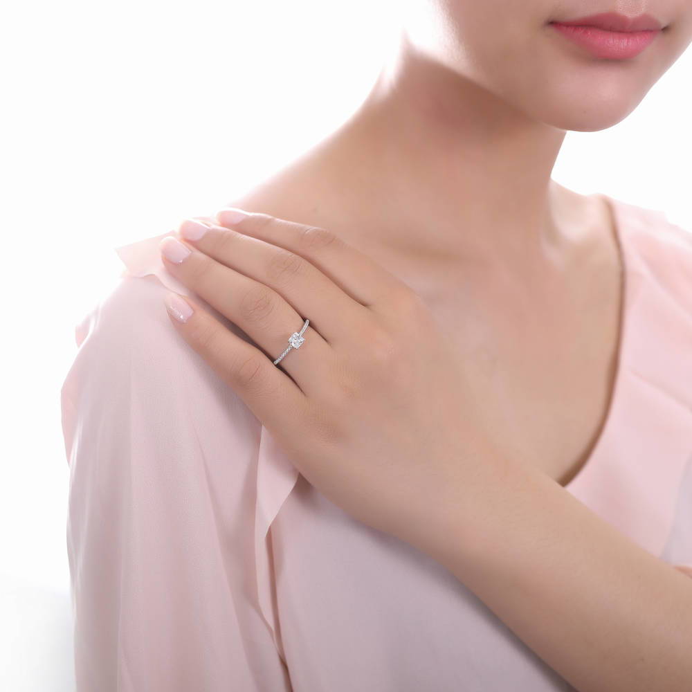 Model wearing Solitaire 0.6ct Cushion CZ Ring Set in Sterling Silver, 6 of 9