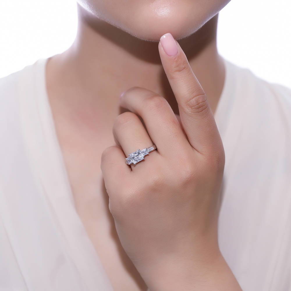 Model wearing 3-Stone 2ct Princess CZ Ring Set in Sterling Silver, 12 of 16