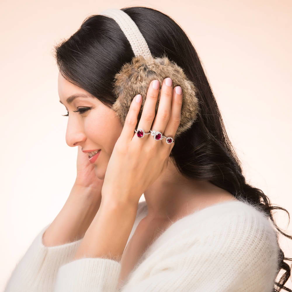 Model wearing Halo Ruby-Red Oval CZ Ring in Sterling Silver, 3 of 10