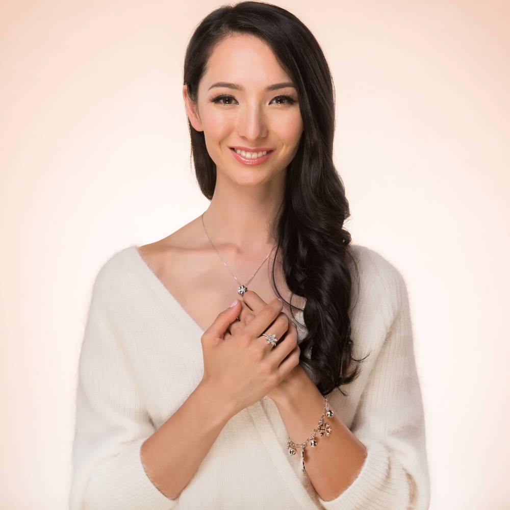 Model wearing Snowflake CZ Ring in Sterling Silver, 3 of 10